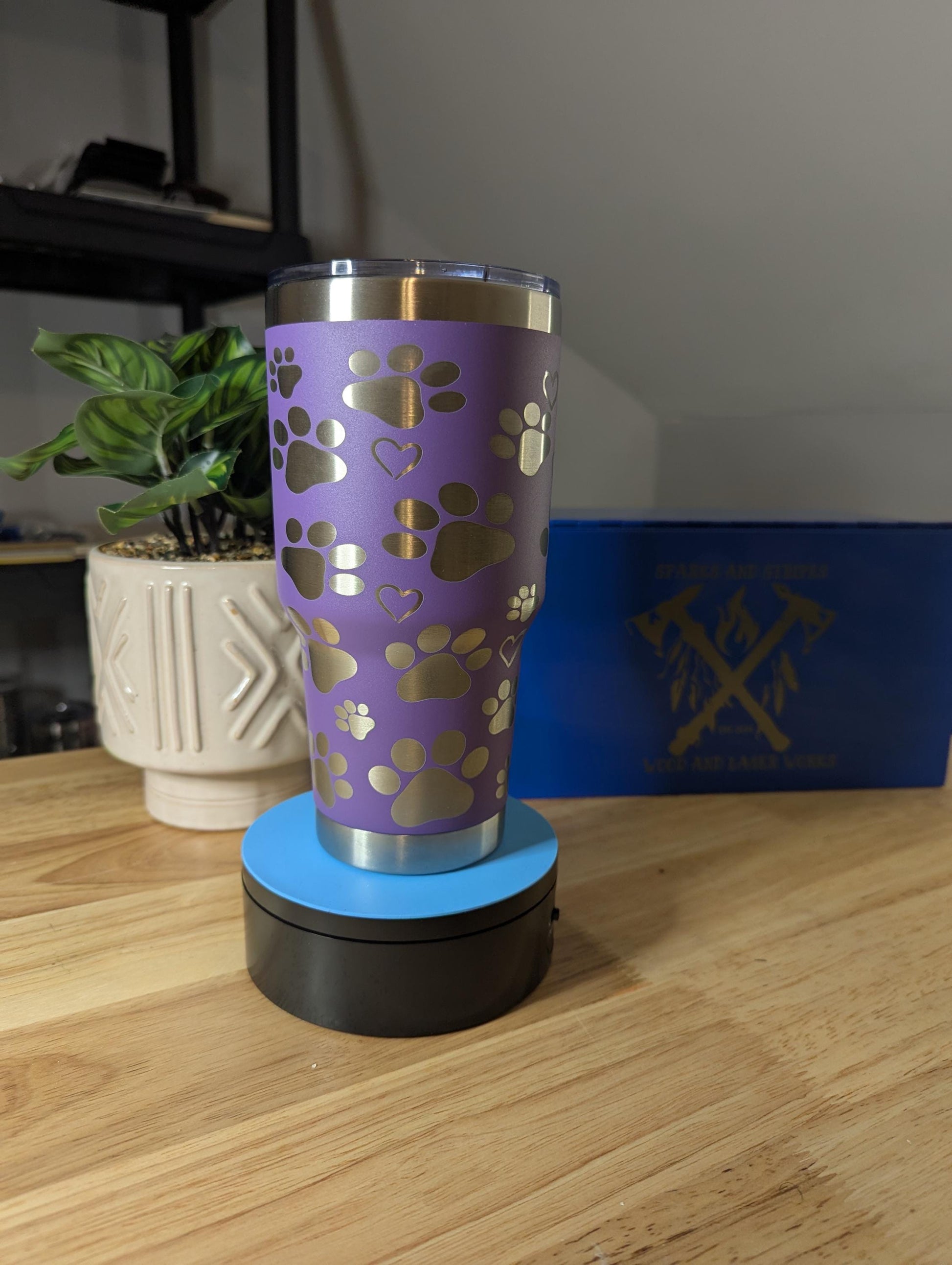 Stunning purple stainless steel 30oz tumbler featuring a pawprint and heart design for your furry friend