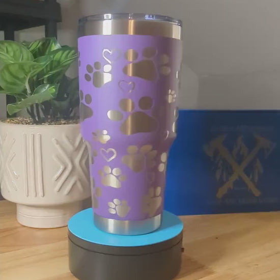 Stunning purple stainless steel 30oz tumbler featuring a pawprint and heart design for your furry friend